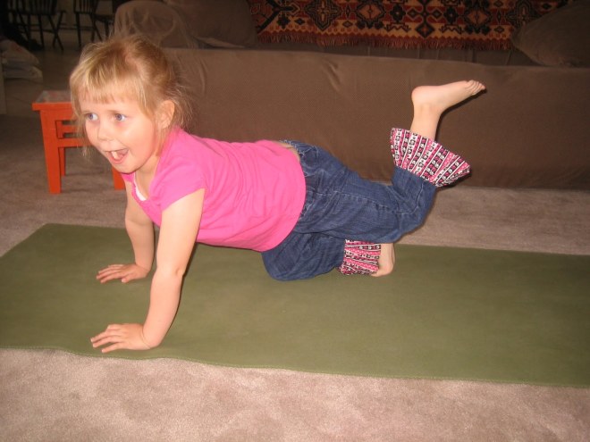 Dog in a fire hydrant Pose. YogaKiddos with Gail