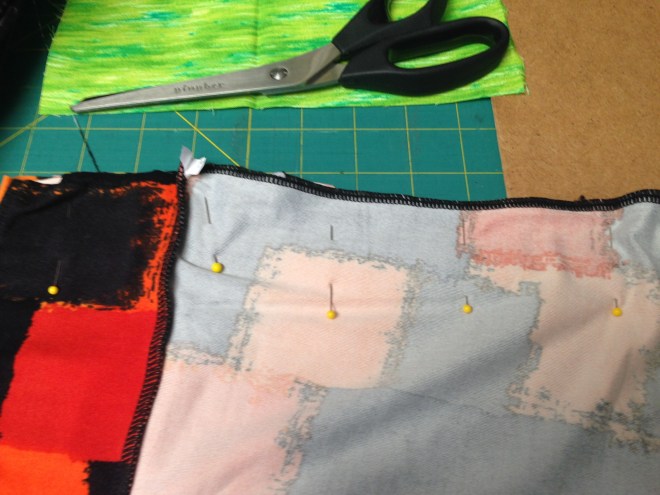 Pin the fabric sides together to prepare to either sew by the machine or hand sew.