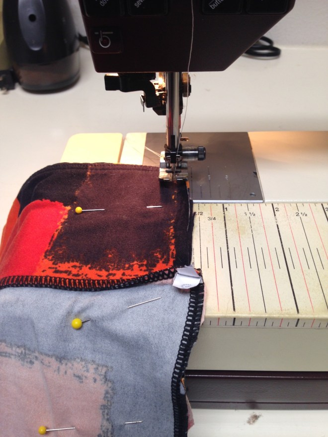 My Pfaff machine getting put to use!  Sewing down the side seam.  I kept the waist band here on this diy face mask.