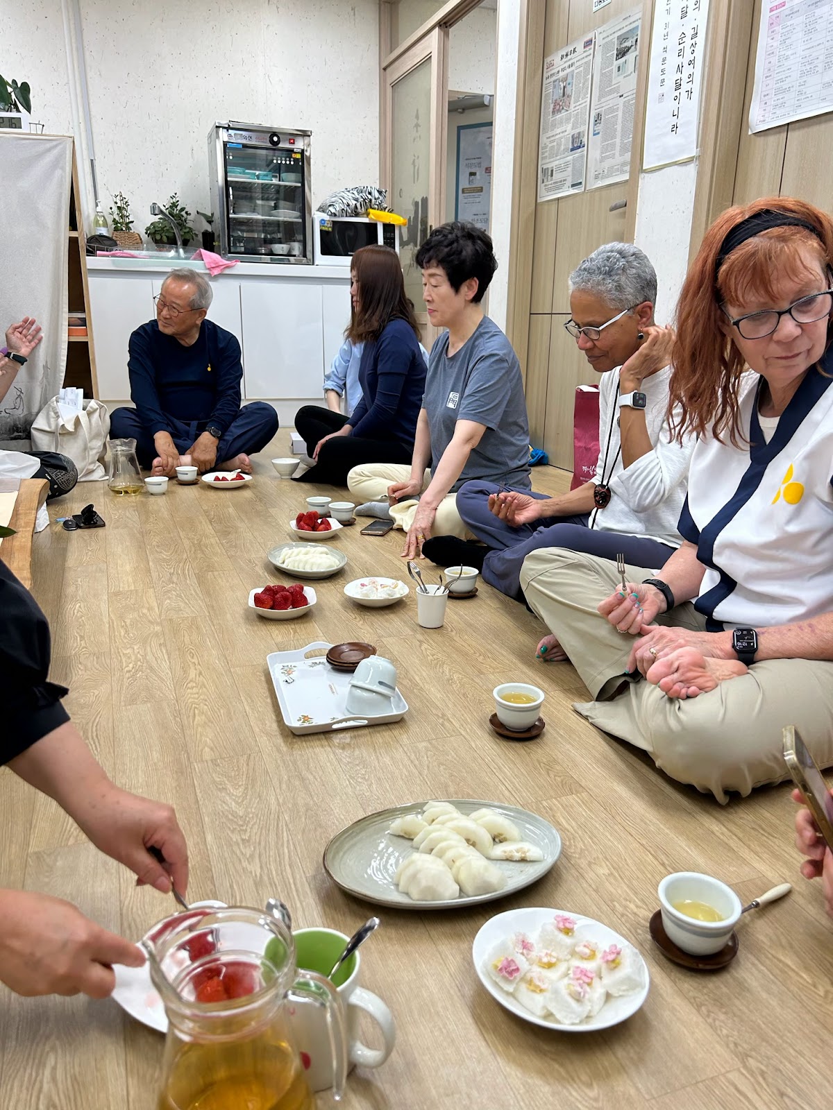 Tea time and snacks with the community members, Teacher M-H and Grandmaster C P Nim.